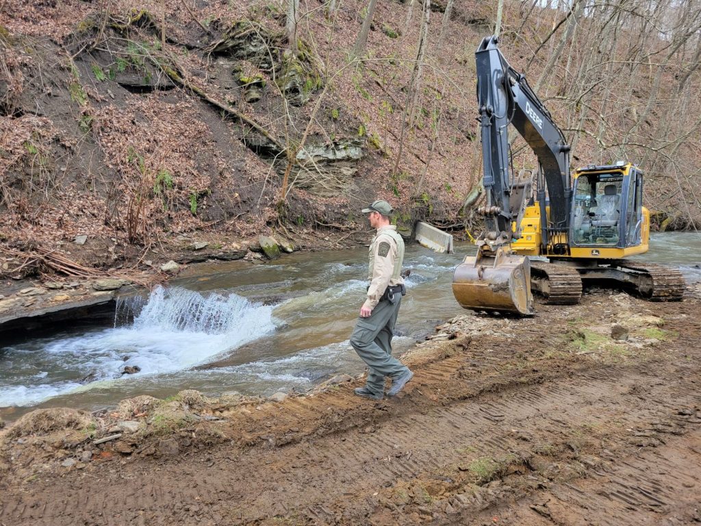 Sinkhole from abandoned mine swallowing Pike Run in Daisytown Herald